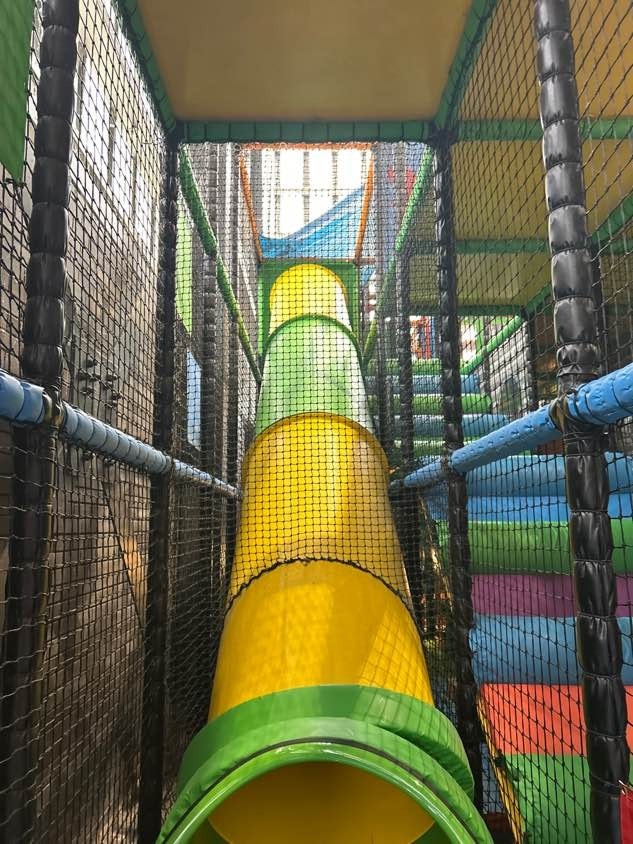 Clean yellow tube slide through the frame after a maintenance visit